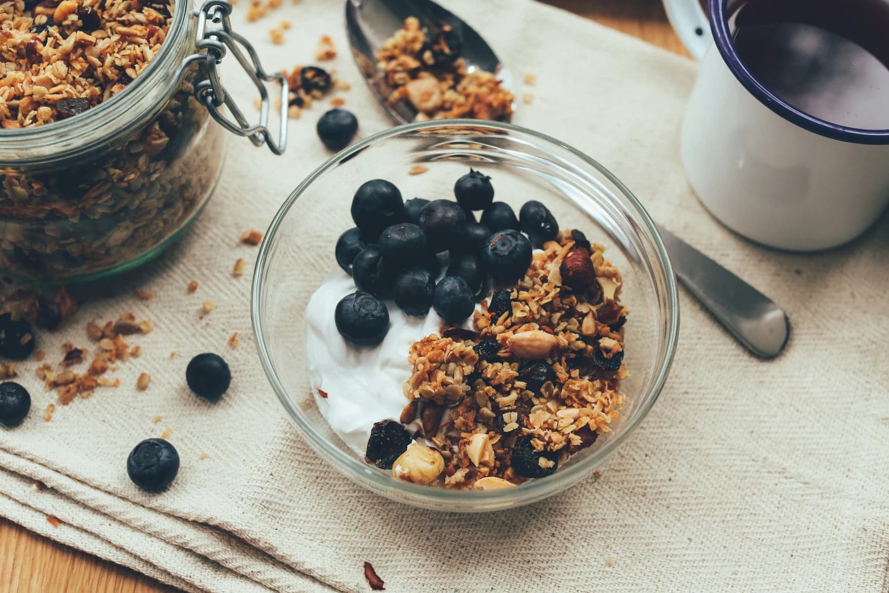 Breakfast photo: yogurt, oats and blueberries in a bowl